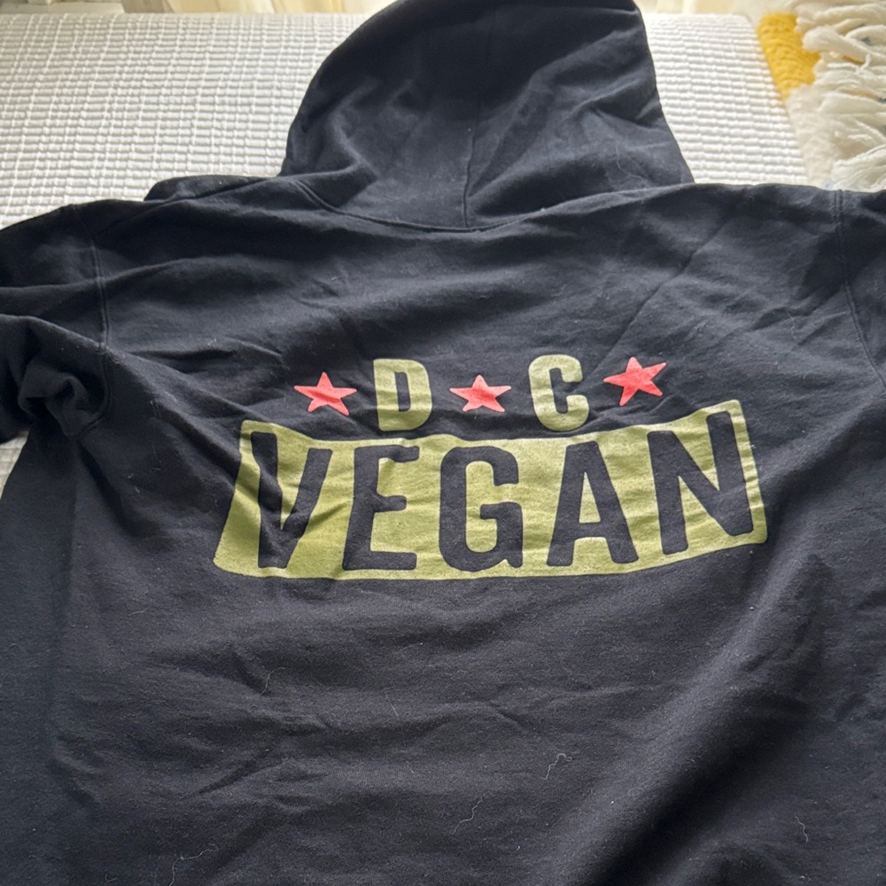 Black hoodie sweatshirt from DC Vegan. Worn once.